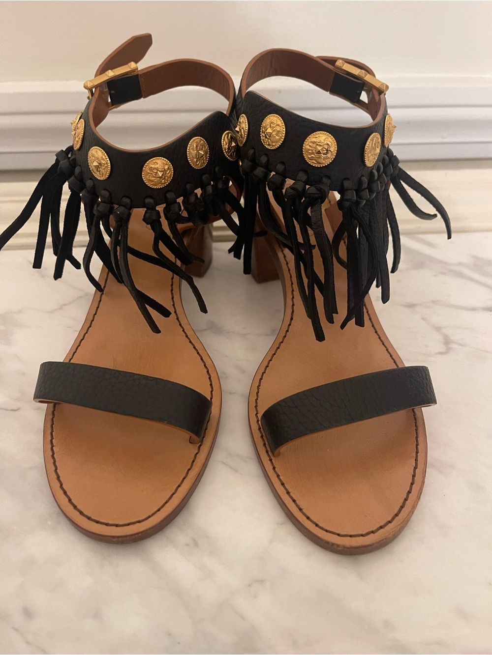 Luxury Valentino Garavani Black Leather Fringe Sandals with Gold Medallions